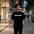 STEALTHY WEALTHY T-Shirt | Minimal Text Graphic Tee, Black Crewneck